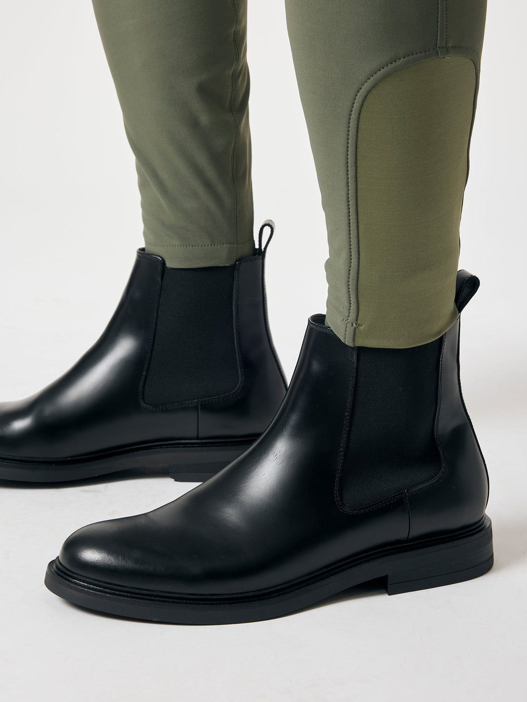 PS of Sweden Capis HG Breeches - Mist Green, close-up of the ankle and knee patch, worn